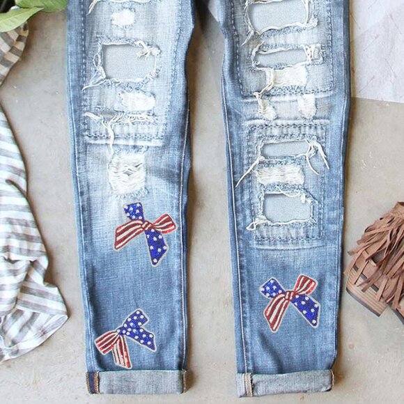 B273 Light Blue USA Flag Bow Graphic Distressed Jeans - Picture 1 of 2